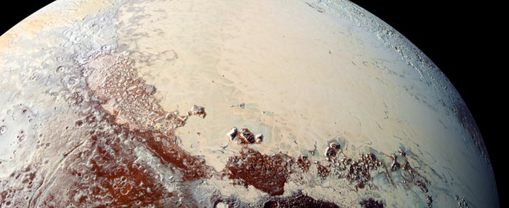 Official Naming of Surface Features on Pluto and its Satellites: First Step Approved